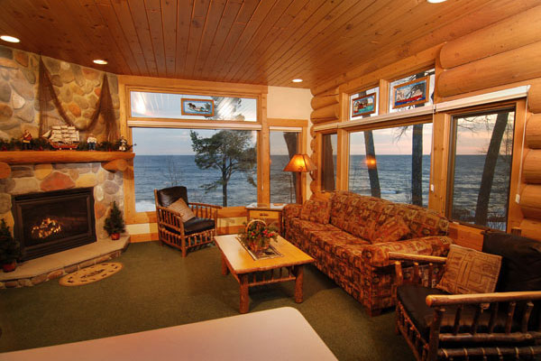 Cabin living room with fireplace on lake